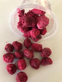 Small, round, red, crumbly baobab seed snacks