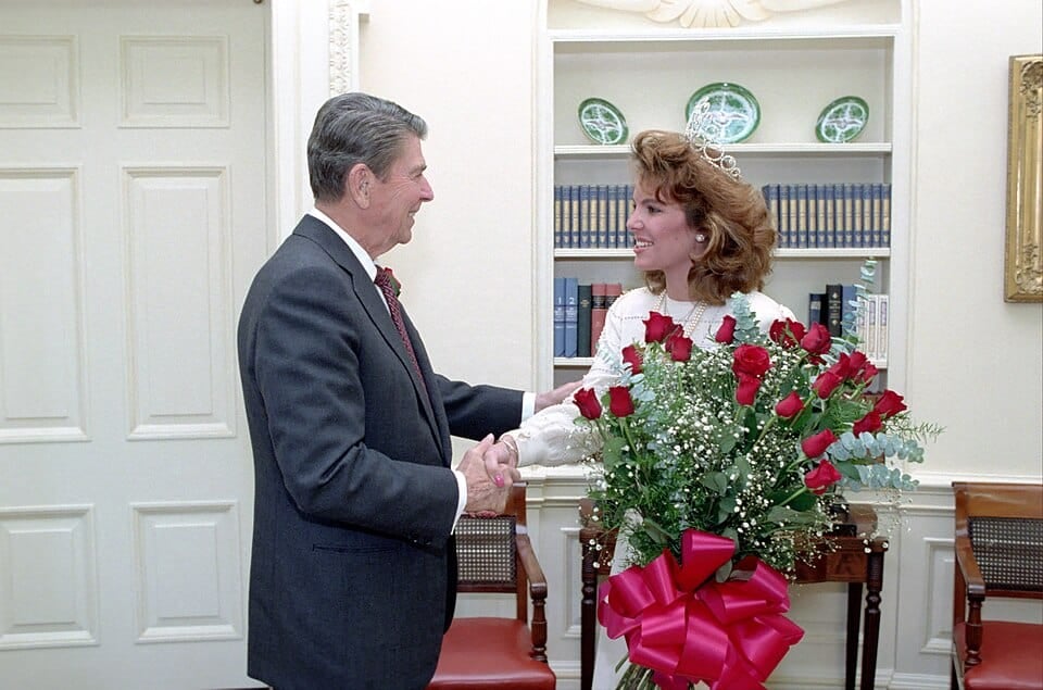 Ronald Reagan with the Tournament of Roses Parade Rose Queen before signing the declaration naming the rose as the U.S. national symbol