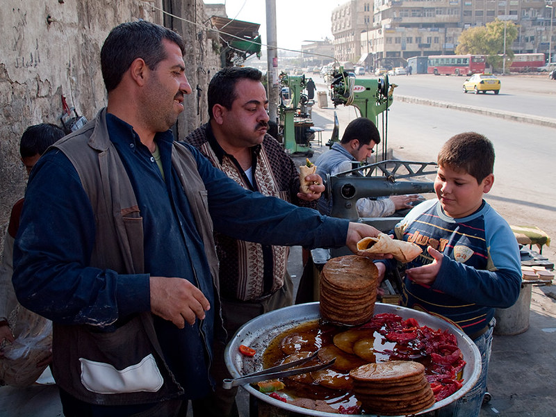 Food vendors in Syria serve Aleppo peppers