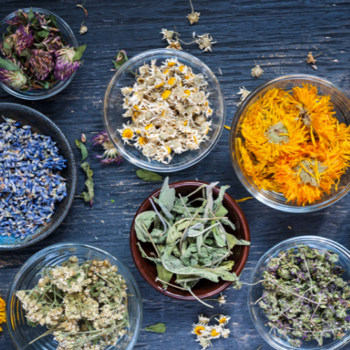 bowls of herbs and flowers