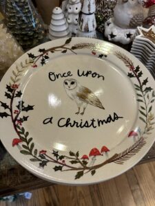 Picture of Christmas plate showing Christmas greens and Amanita mushrooms